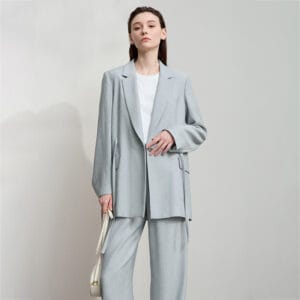 Commuter-Style Top With Straps Wide Shoulder Pads And A Belt